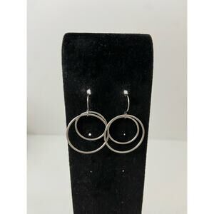 Circular dangle earrings silver tone
